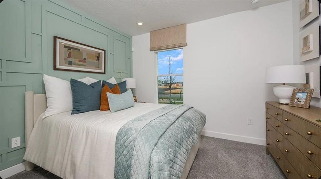 Furnished interior view inside a new home in Esplanade at McKinnon Groves, Winter Garden (Image 9).