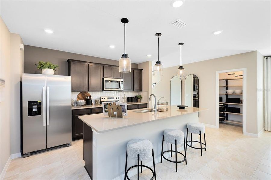 Furnished interior view inside a new home in EverBe, Orlando (Image 12).