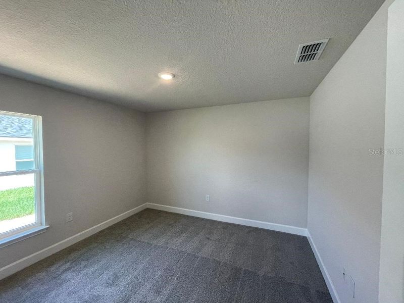 Spacious, unfurnished interior of a new home in Abbey Glen, Dade City (Image 26).