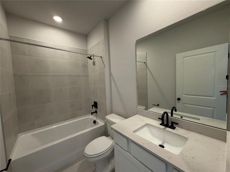 Furnished interior view inside a new home in Reserve East, Flagler Beach (Image 11).