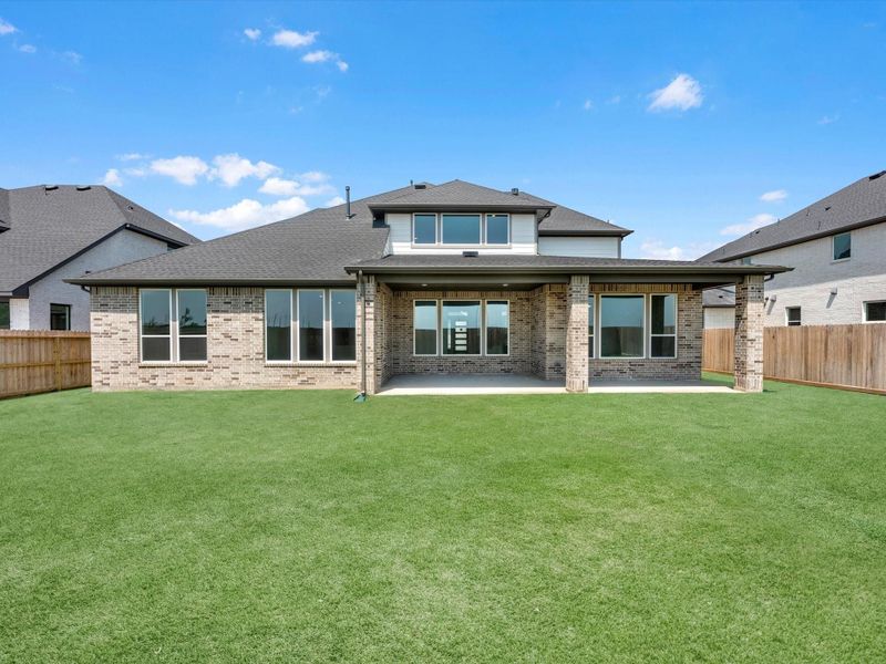 Exterior details and patio area of a home in Harvest Green, Richmond (Image 3).