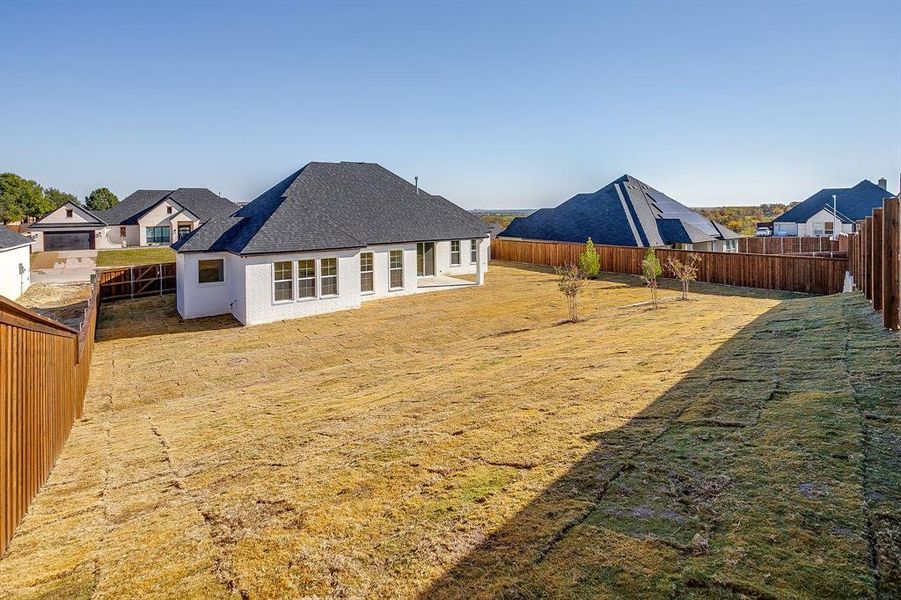 Exterior details and patio area of a home in Whitestone Heights, Benbrook (Image 30).