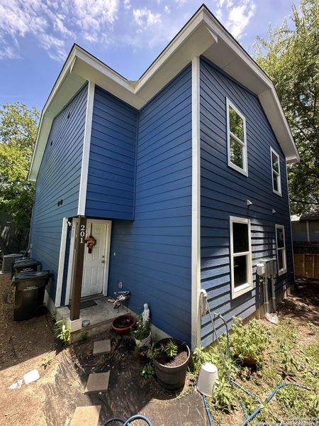 Front exterior of a new home in , San Antonio, TX, highlighting curb appeal (Image 9).