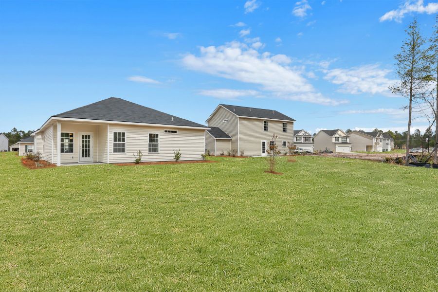Representative exterior photo of a completed home built from the The Basswood by RTS Homes in Grand Reserve, Hinesville, GA (Image 19). Representative exterior photo of a completed home built from the The Basswood by RTS Homes in Grand Reserve, Hinesville, GA (Image 19).