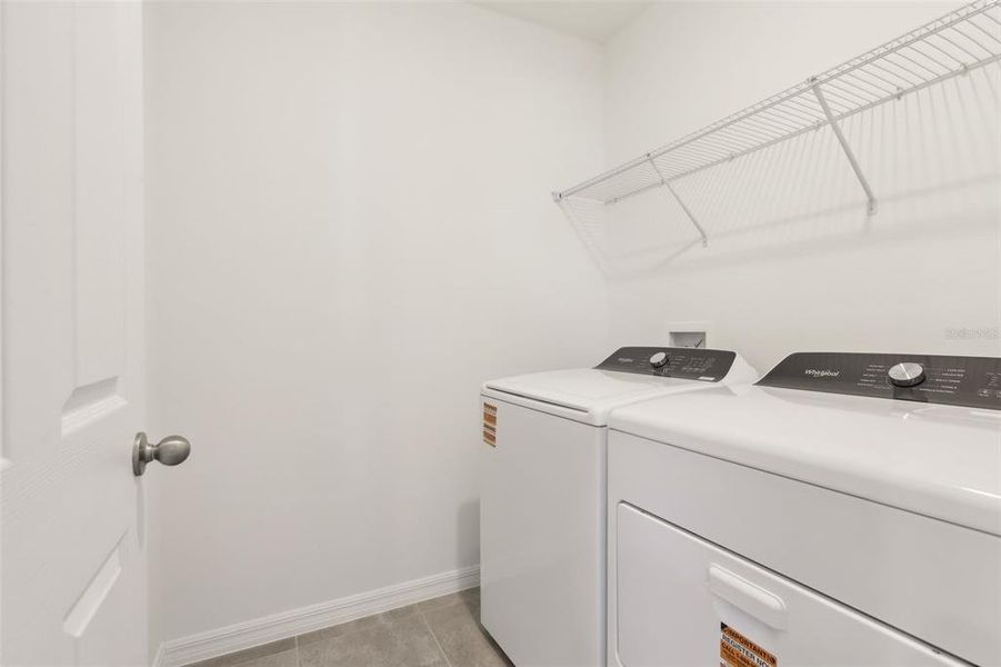Furnished interior view inside a new home in Springs at Lake Alfred - Signature Series, Lake Alfred (Image 13).