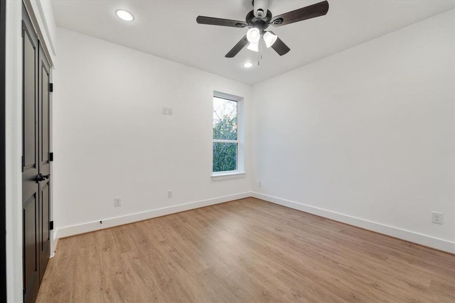 Bedroom #3. Also offers recessed lights, spacious closet and a ceiling fan. Best of all, NO CARPET in this whole house!