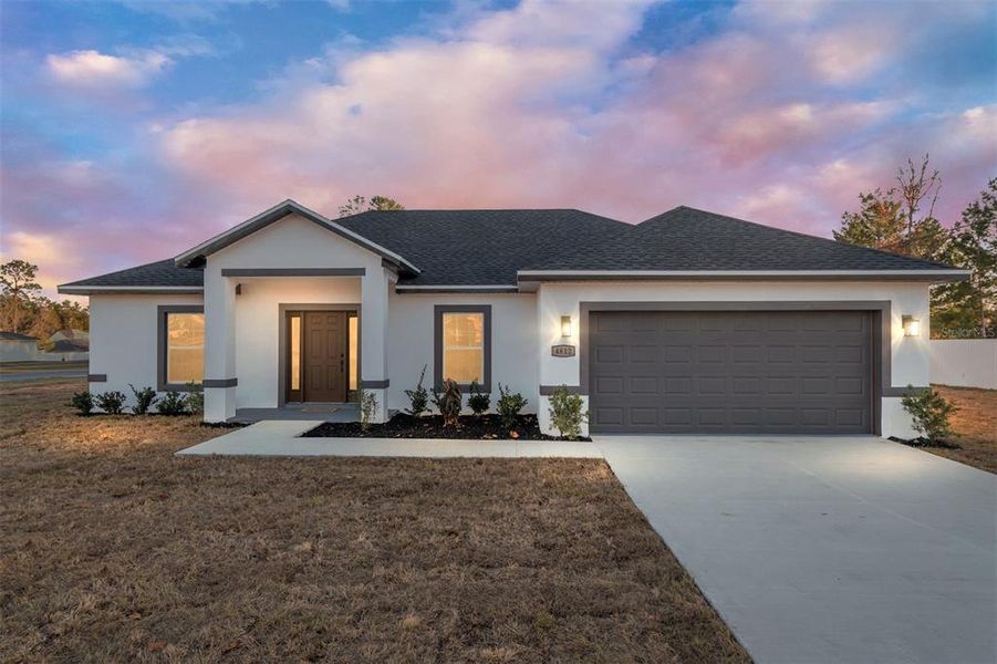 Front exterior of a new home in , Ocala, FL, highlighting curb appeal (Image 30).