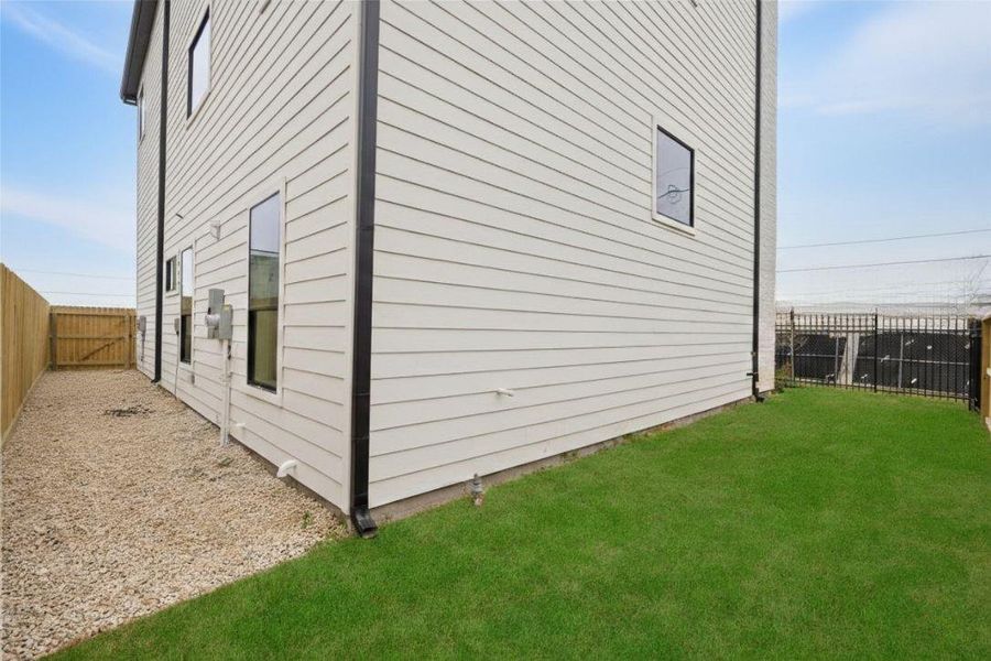 Exterior details and patio area of a home in , Houston (Image 19). Exterior details and patio area of a home in , Houston (Image 19).
