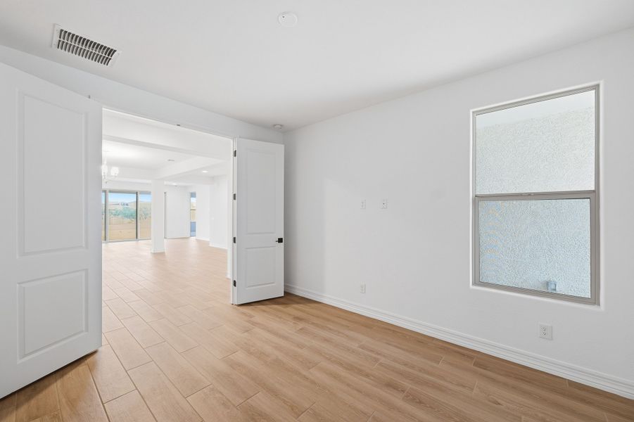 Spacious, unfurnished interior of a new home in Artisan at Asante, Surprise (Image 17).