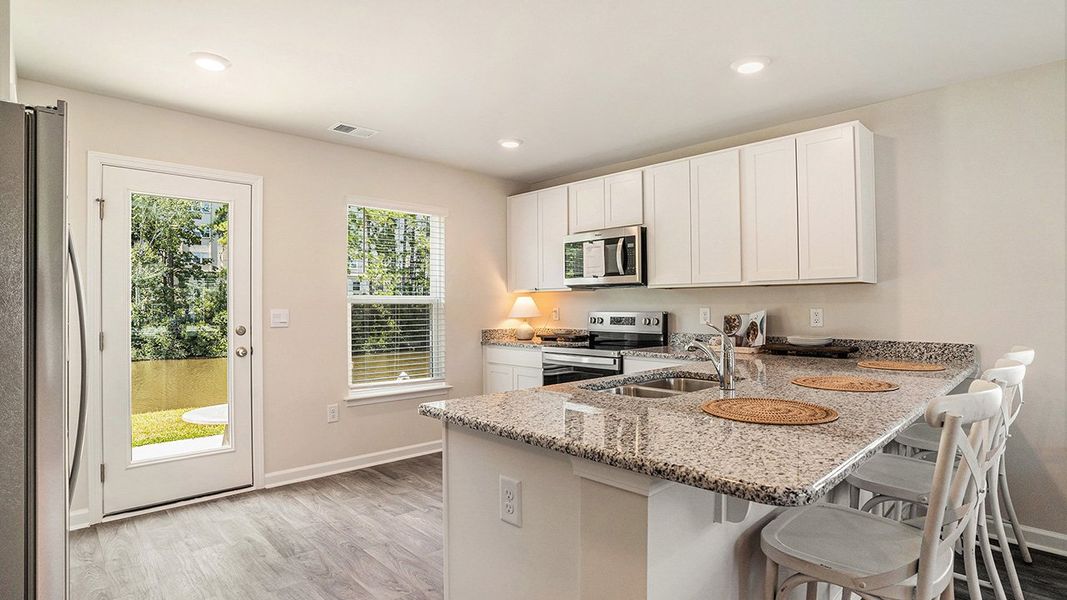 Furnished interior view inside a new home in Sutton Farm, Loris (Image 4).