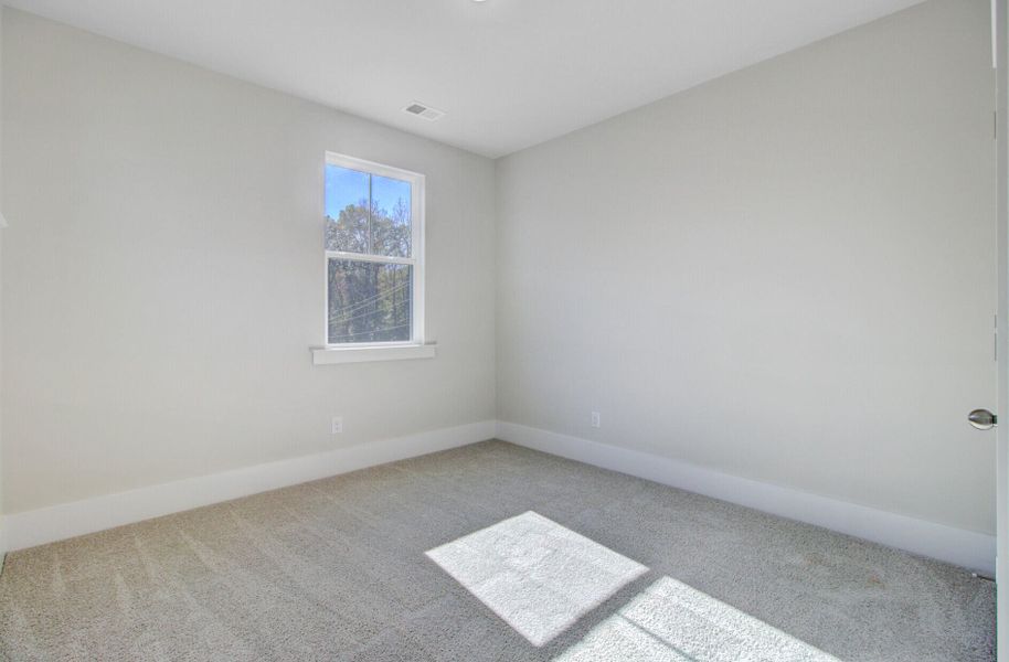 Spacious, unfurnished interior of a new home in Indigo Grove Single Family Homes, Johns Island (Image 37).