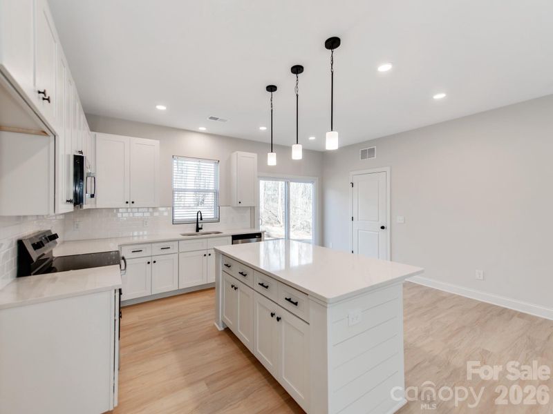 Furnished interior view inside a new home in , Statesville (Image 7).