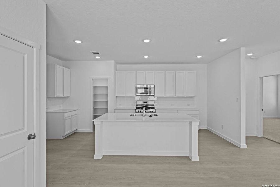 Furnished interior view inside a new home in Waterwheel, San Antonio (Image 6).