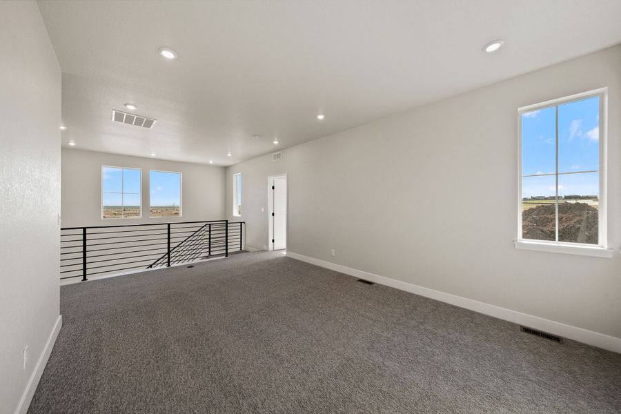 Spacious, unfurnished interior of a new home in Trumark Homes at Sterling Ranch, Littleton (Image 27).