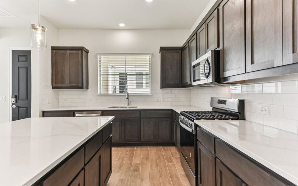 Furnished interior view inside a new home in Villas at Kissing Tree, San Marcos (Image 7).