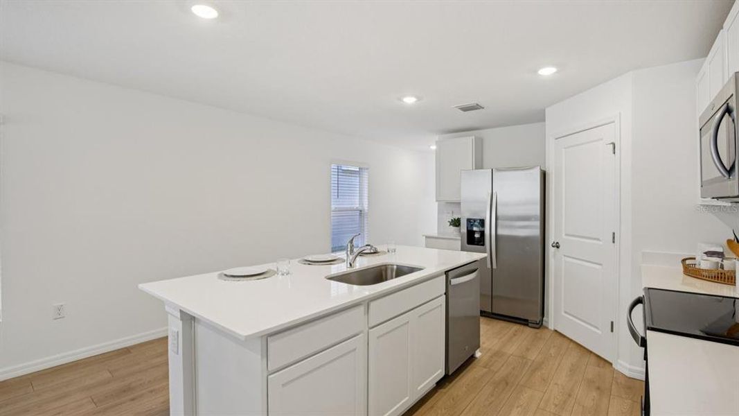 Furnished interior view inside a new home in , Dade City (Image 14).
