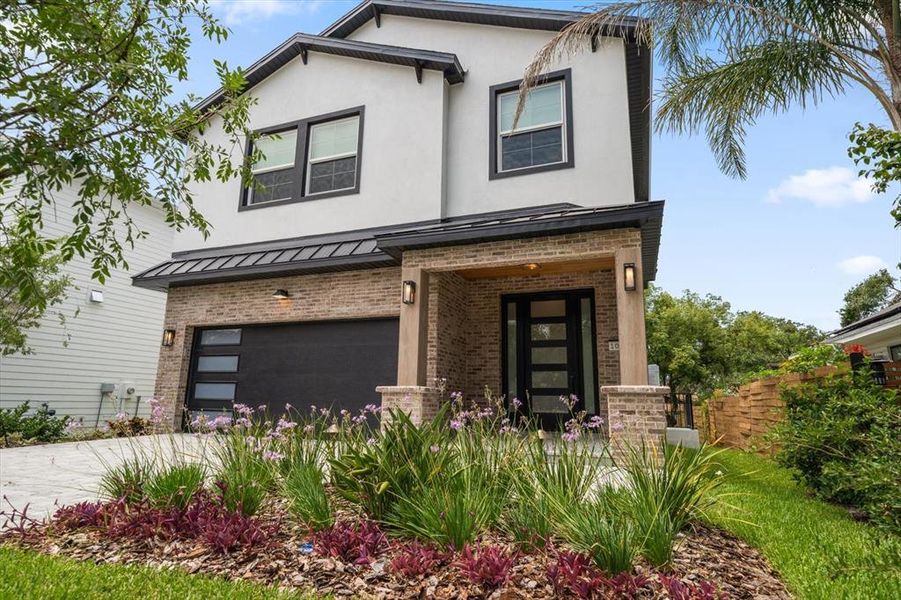 Front exterior of a new home in , Dunedin, FL, highlighting curb appeal (Image 24). Front exterior of a new home in , Dunedin, FL, highlighting curb appeal (Image 24).