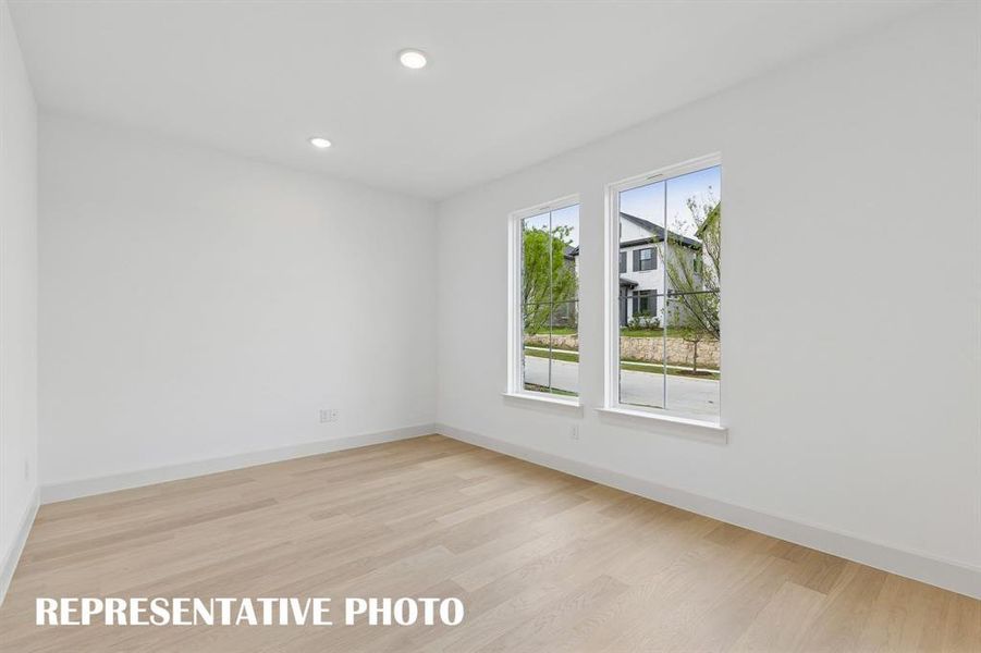 For the professional needing to work from home, our Louis plan offers a spacious light filled home office just off the main entry.  REPRESENTATIVE PHOTO