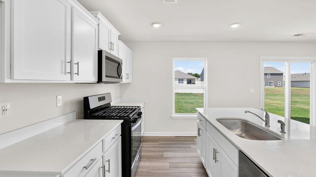 Furnished interior view inside a new home in Bentley Park, Greenwood (Image 10).