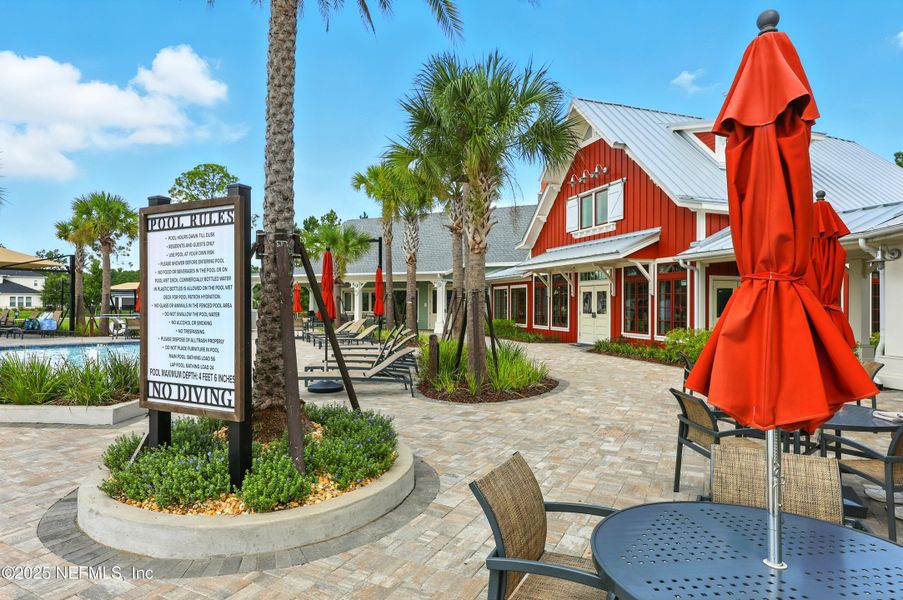 Front exterior of a new home in Reverie at TrailMark, St. Augustine, FL, highlighting curb appeal (Image 16). Front exterior of a new home in Reverie at TrailMark, St. Augustine, FL, highlighting curb appeal (Image 16).