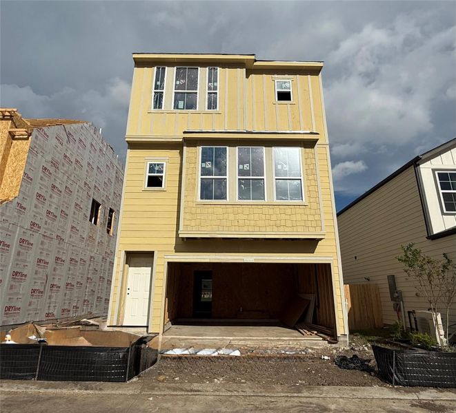 Three-story home with 4 bedrooms, 3.5 baths and 2 car garage