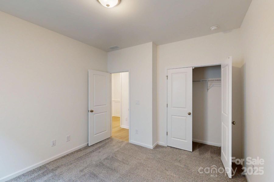 Main level secondary bedroom Main level secondary bedroom