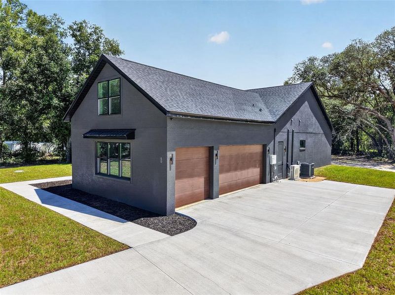 Front exterior of a new home in , Ocklawaha, FL, highlighting curb appeal (Image 26). Front exterior of a new home in , Ocklawaha, FL, highlighting curb appeal (Image 26).
