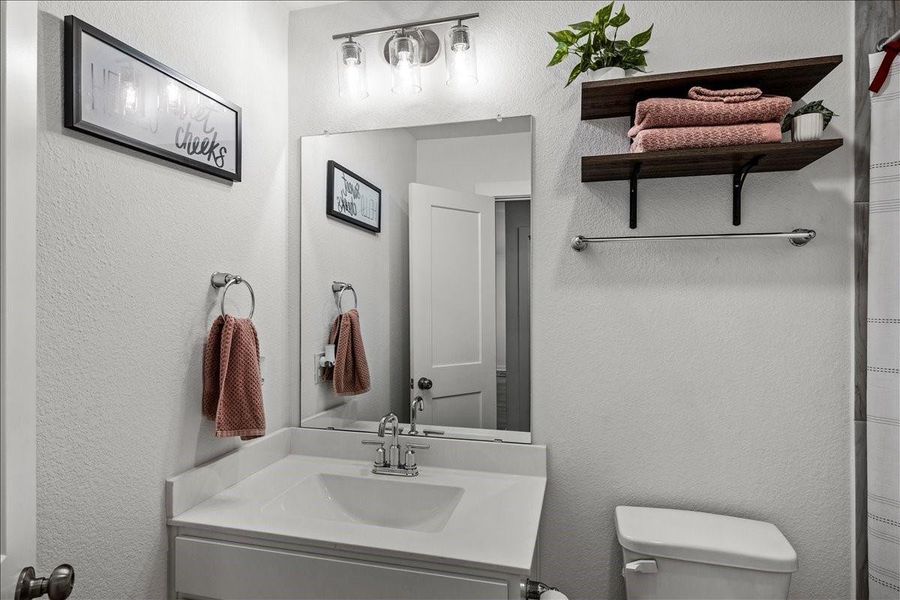 Furnished interior view inside a new home in Mustang Crossing, Alvin (Image 6).