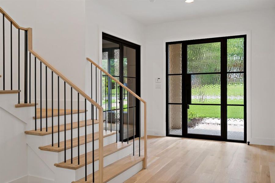 Just inside the entry are the French doors leading to the office at the front of the home.