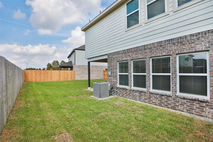 Exterior details and patio area of a home in Park at Eldridge, Sugar Land (Image 27). Exterior details and patio area of a home in Park at Eldridge, Sugar Land (Image 27).