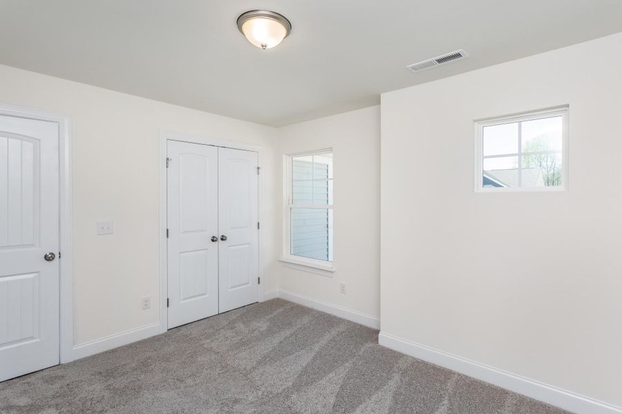 Spacious, unfurnished interior of a new home in Daniel Farms, Benson (Image 25).