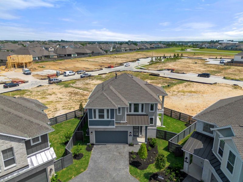 Front exterior of a new home in Bridgeland, Cypress, TX, highlighting curb appeal (Image 16).