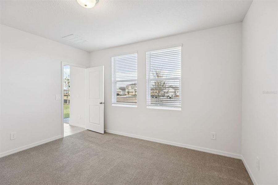 Spacious, unfurnished interior of a new home in Crosswinds - Classic Series, Haines City (Image 16).