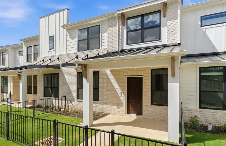 Exterior details and patio area of a home in Monarch on Main, Round Rock (Image 17).