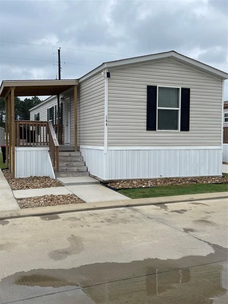 Exterior details and patio area of a home in , Tomball (Image 21).
