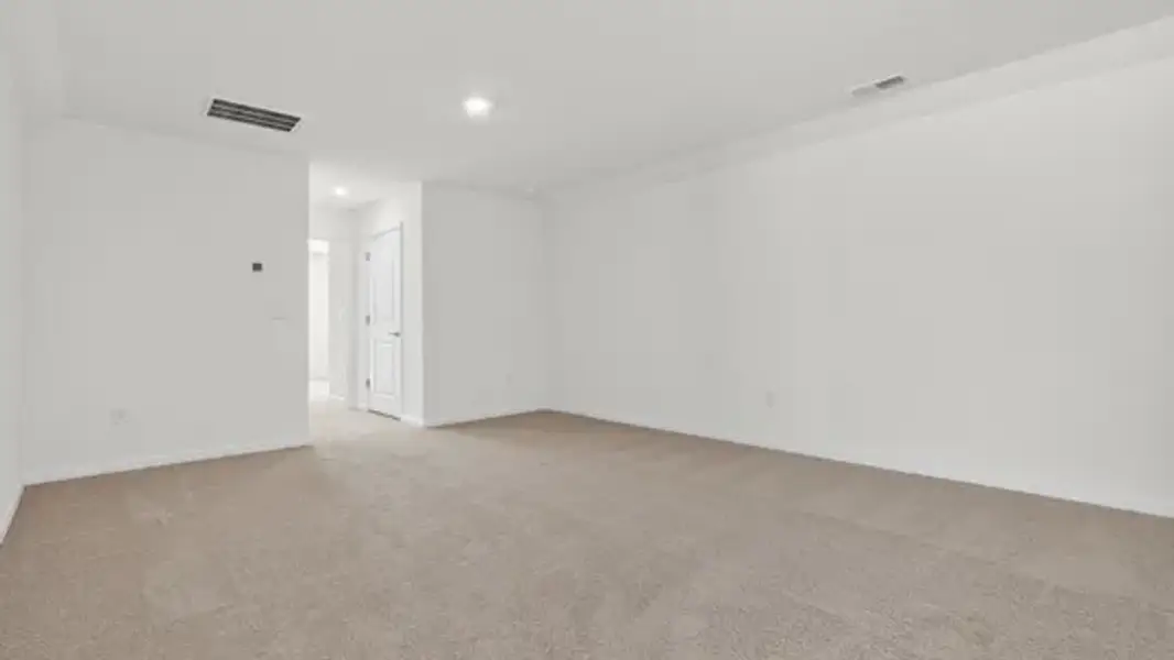 Spacious, unfurnished interior of a new home in The Villas at Galvins Ridge, Sanford (Image 25).