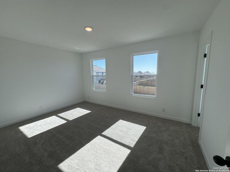 Spacious, unfurnished interior of a new home in Enclave at Hennersby Hollow 50's, San Antonio (Image 31).