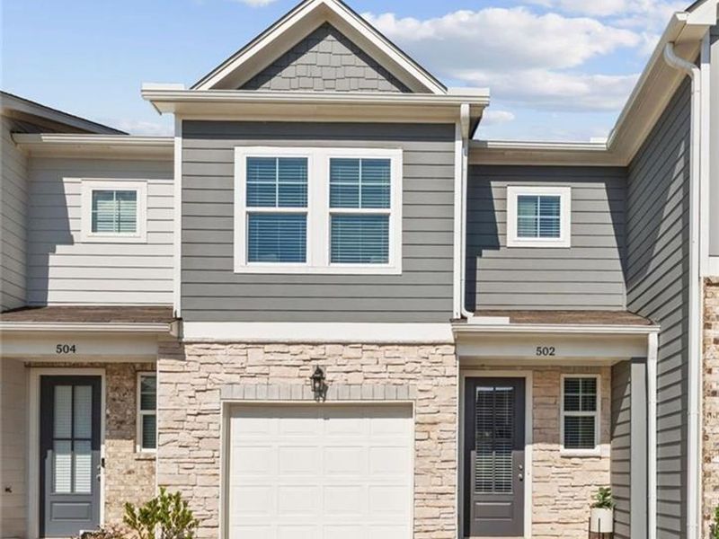 Front exterior of a new home in Stegall Village, Emerson, GA, highlighting curb appeal (Image 29).