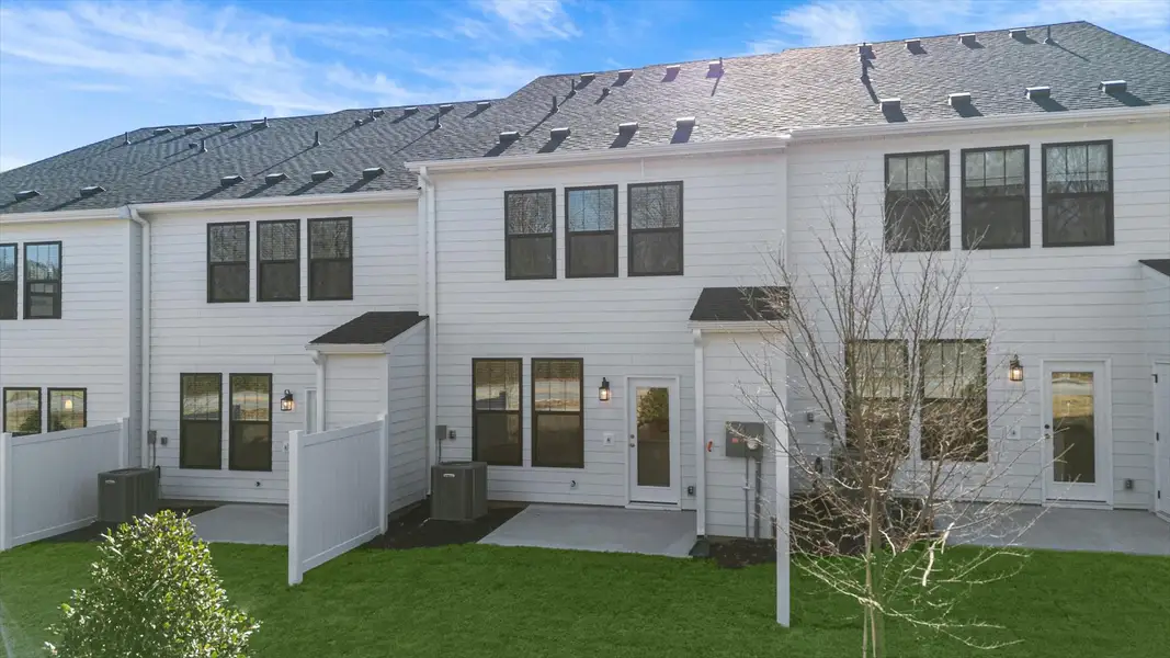 Exceptional outdoor living begins with a private backyard in this thoughtfully designed home at Gresham Station