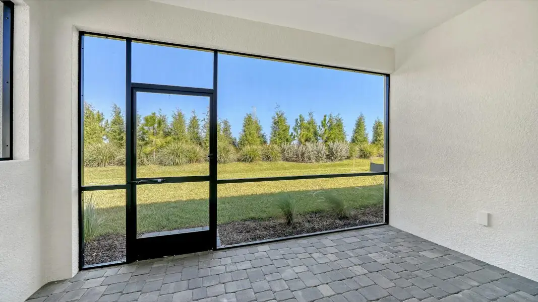 Exterior details and patio area of a home in Windward Real Estate and Homes for Sale in Sarasota, FL - Neal Communities, Sarasota (Image 2). Exterior details and patio area of a home in Windward Real Estate and Homes for Sale in Sarasota, FL - Neal Communities, Sarasota (Image 2).