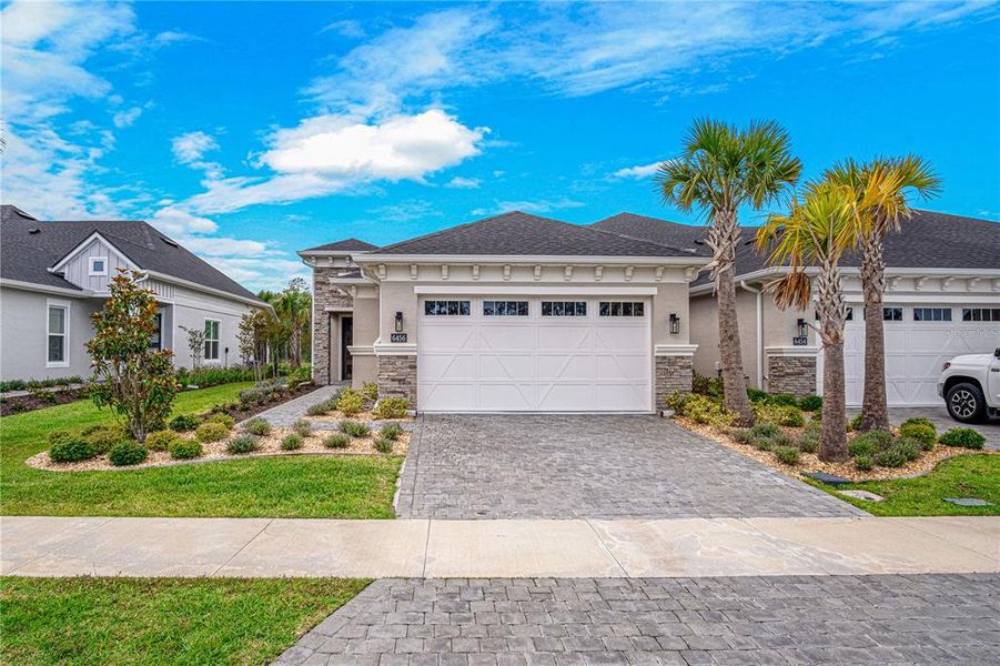 Front exterior of a new home in , Port Orange, FL, highlighting curb appeal (Image 20).