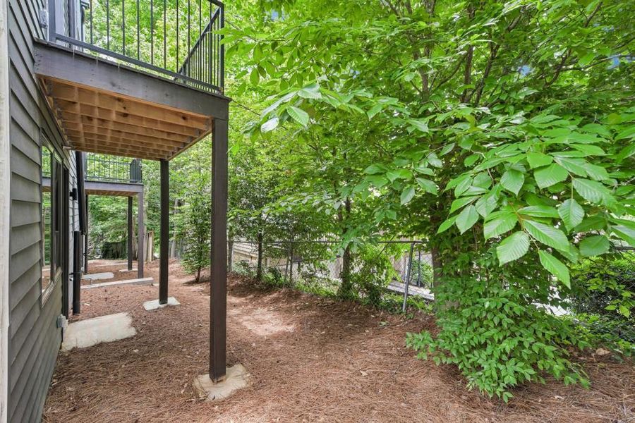 Exterior details and patio area of a home in Overlook at Moda, Decatur (Image 37). Exterior details and patio area of a home in Overlook at Moda, Decatur (Image 37).