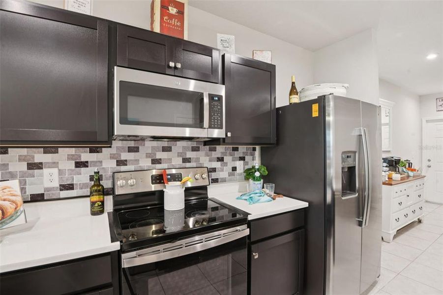 Furnished interior view inside a new home in Anclote Square, Holiday (Image 12).
