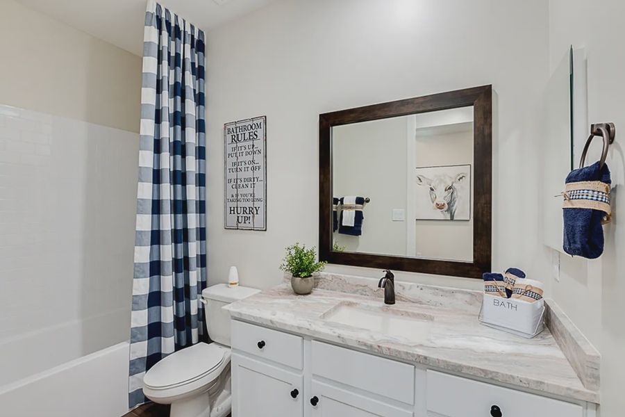 Representative furnished interior of a home built from the 3102 by Elliott Homes in Las Barrancas, Yuma (Image 15).