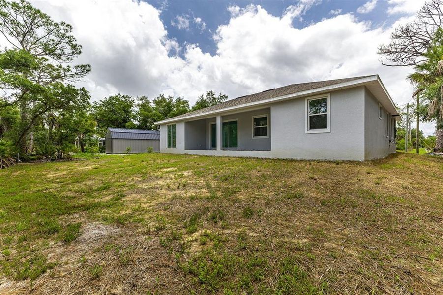 Exterior details and patio area of a home in , Port Charlotte (Image 14).