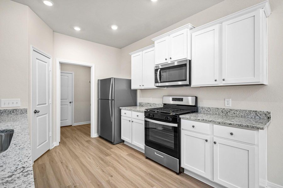 Furnished interior view inside a new home in Trails at Cochran Ranch, Waller (Image 7).