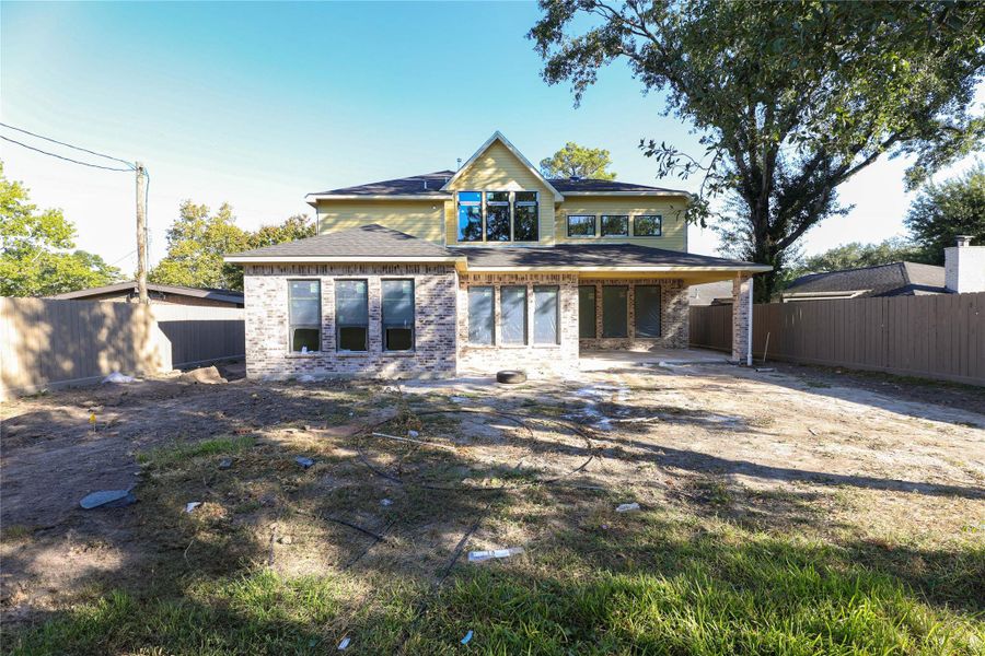 Back Yard - Large enough for a Pool! Photo taken during mid-construction 10/13/25 Back Yard - Large enough for a Pool! Photo taken during mid-construction 10/13/25