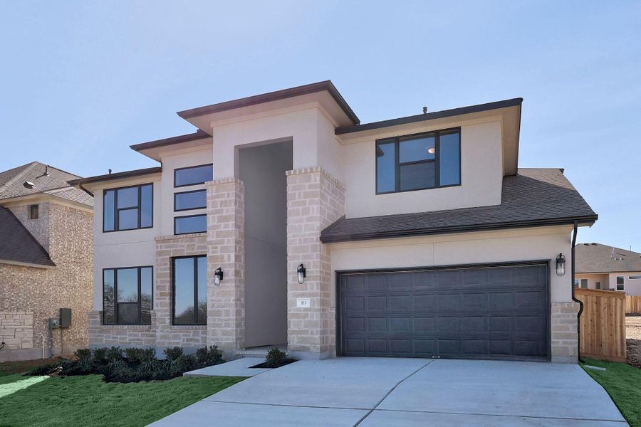 Front exterior of a new home in Nolina, Georgetown, TX, highlighting curb appeal (Image 21).