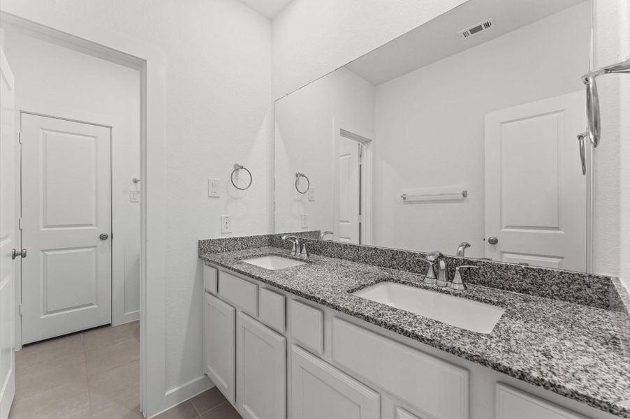 Furnished interior view inside a new home in , Manvel (Image 12).
