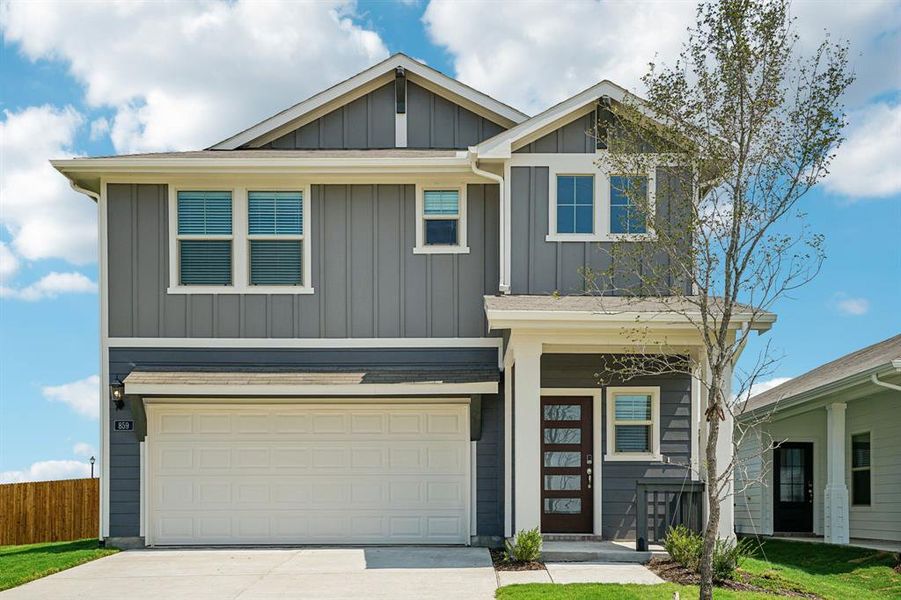 Front exterior of a new home in Trails of Lavon - Spring Series, Lavon, TX, highlighting curb appeal (Image 23).